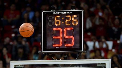 is there a shot clock in high school basketball How does the absence of a shot clock impact the game's flow and strategic decisions?